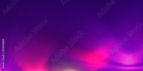 Violet wall backlit by pink light.