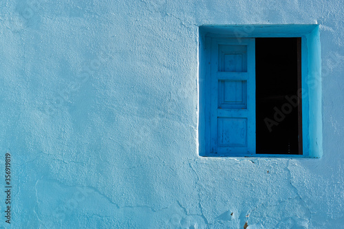 architectural details of Juzcar, Spanish city of Malaga. Located in the Genal Valley in the Serranía de Ronda. The town was painted blue as the setting to shoot a famous movie. © Jesnofer