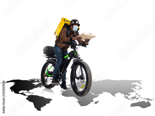 Fototapeta Naklejka Na Ścianę i Meble -  Home delivery, food purchase via the Internet. Deliveryman on bike arriving to any address worldwide on map with your order. Man hurrying up to delivery point with thermo bag. Courier service, safety.