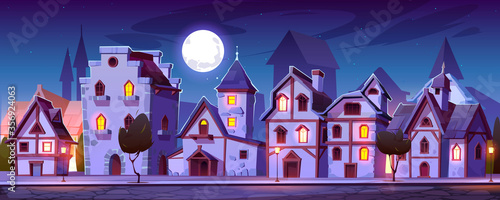 Medieval town street with old european buildings at night. Vector cartoon cityscape with vintage facade of houses with brick wall and wooden doors, trees, stone road and pavement in moon light