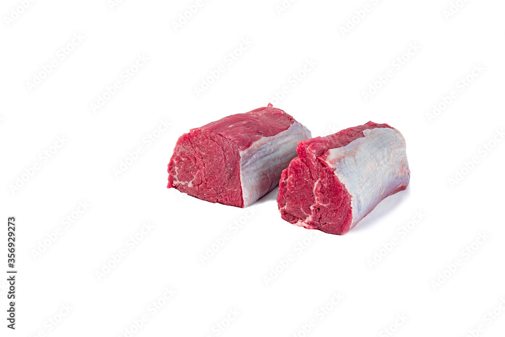 Dry aged beef fillet steak natural as closeup on white background with copy space – isolated