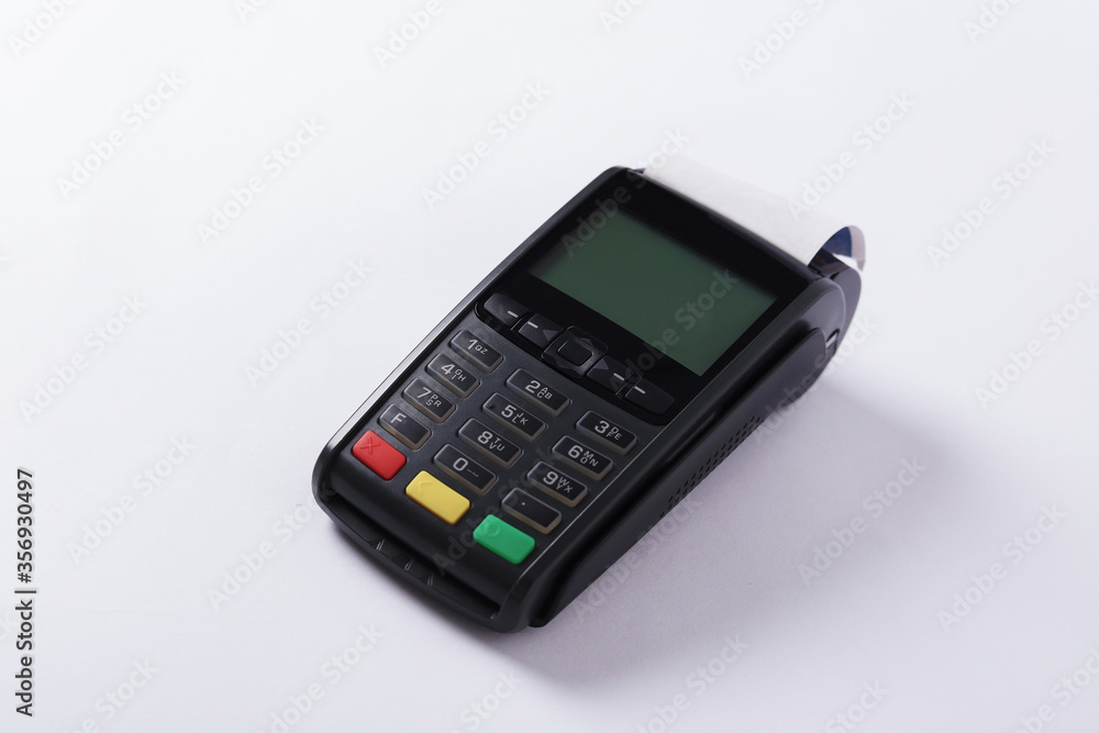 Credit Card Reader isolated on white background. POS Terminal With Receipt Printer. Card Machine. Credit Cards. Payments and Transactions. Retail Equipment. Contactless Payment. NFC. Credit Card Reader isolated on white background. POS Terminal With Receipt Printer. Card Machine. Credit Cards. Payments and Transactions. Retail Equipment. Contactless Payment. NFC.