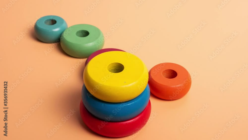 pieces of colorful wooden toys on movement pieces of colorful wooden toys on movement