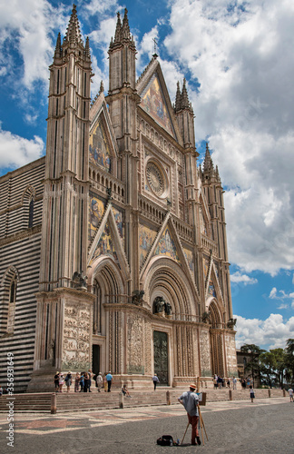 Italy, Orvieto, italian art, cathedral of Orvieto, Tuscany, View from below the facade of the cathedral, blue sky background