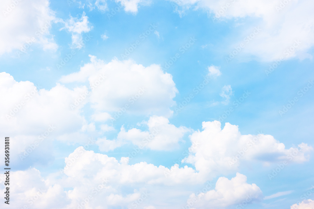 Pastel blue sky with white haep clouds - obrazy, fototapety, plakaty 