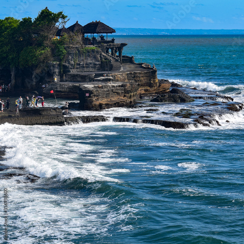 Evening in Tanha Lot, Bali Indonesia, Beautiful Tanha lot beach view in the evening at Bali photo