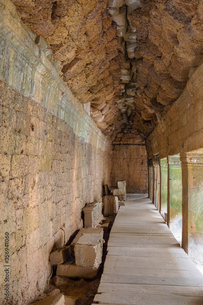 inside the tunnel Bayon temple, Angkor Wat complex, Siem Reap, Cambodia.