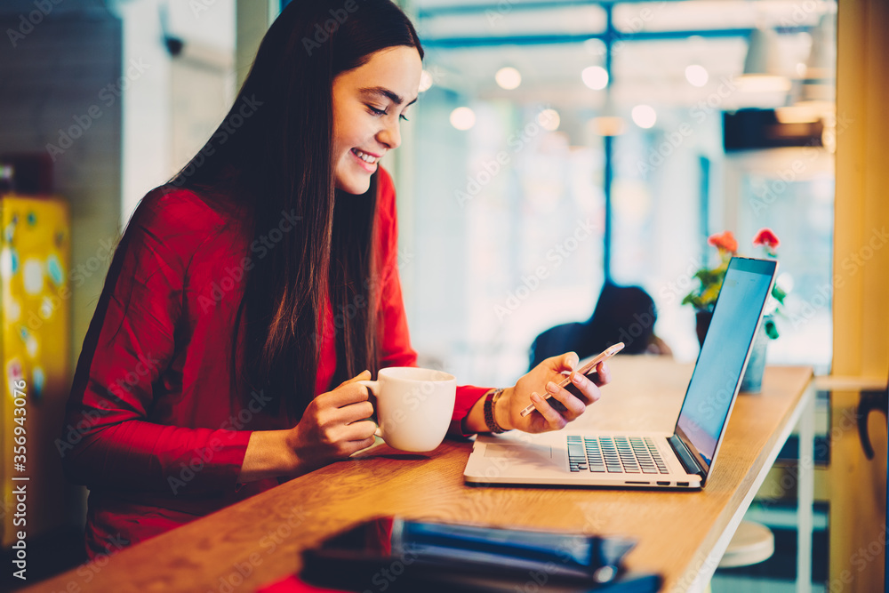 Portrait of positive skilled female freelancer making plans Portrait of positive skilled female freelancer making plans