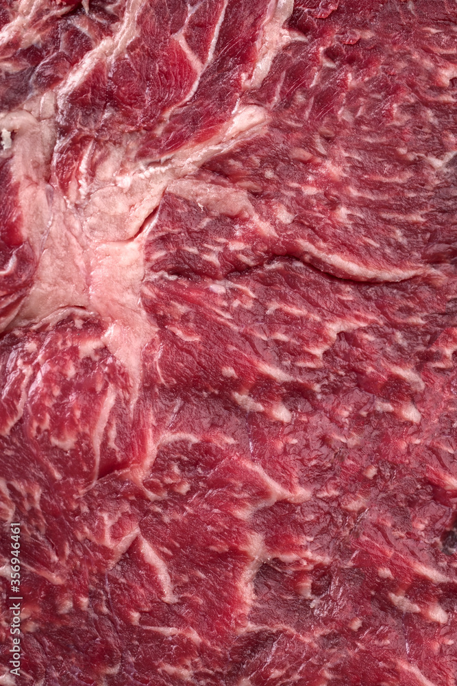 Raw dry aged wagyu rib-eye steak as close-up