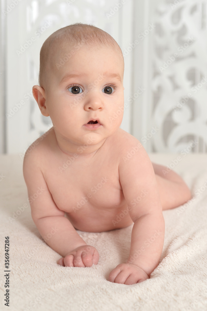 Portrait of cute little baby boy on bed Portrait of cute little baby boy on bed