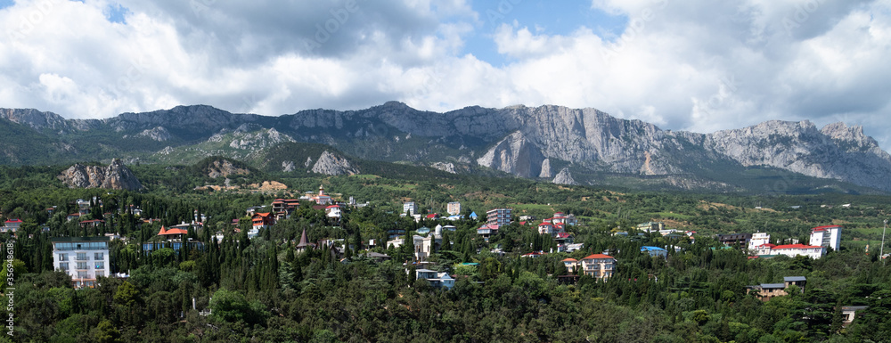 Fototapeta premium Panorama of the resort Simeiz city on background of the Crimean mountains