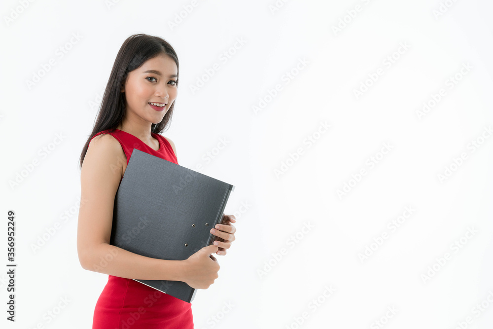 Portrait of young Asian beautiful business woman wears business red dress is holding file isolated white background. Portrait of young Asian beautiful business woman wears business red dress is holding file isolated white background.