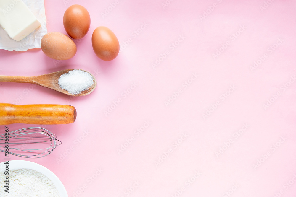 Ingredients and tools for cooking on a pink pastel background. Confectionery concept. Ingredients and tools for cooking on a pink pastel background. Confectionery concept.