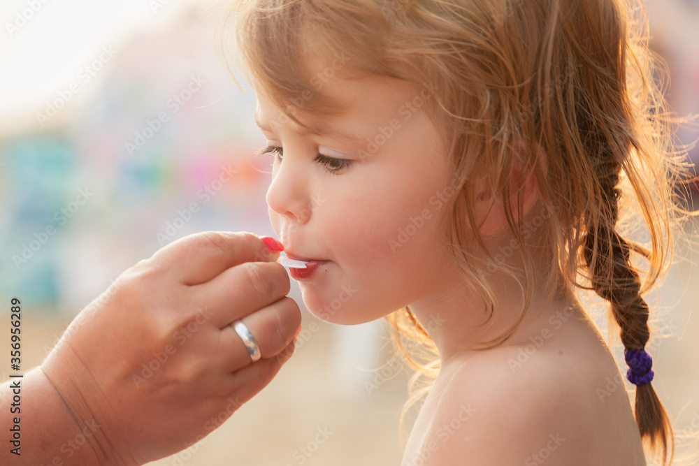 little girl eating ice cream