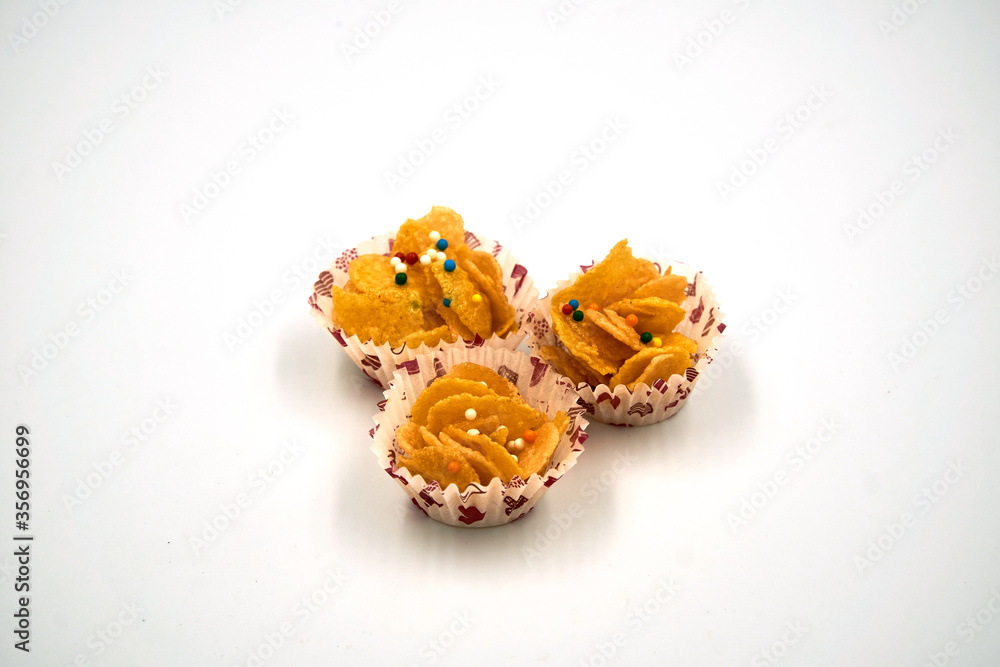 Corn flake biscuit over white background Corn flake biscuit over white background