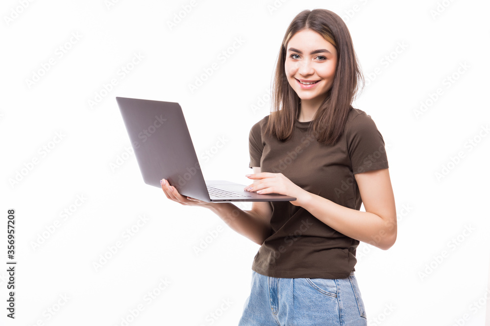Young woman working on laptop isolated on white background Young woman working on laptop isolated on white background