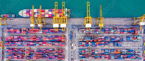 Top view of Deep water port with cargo ship and containers. It is an import and export cargo port where is a part of shipping dock and export products worldwide