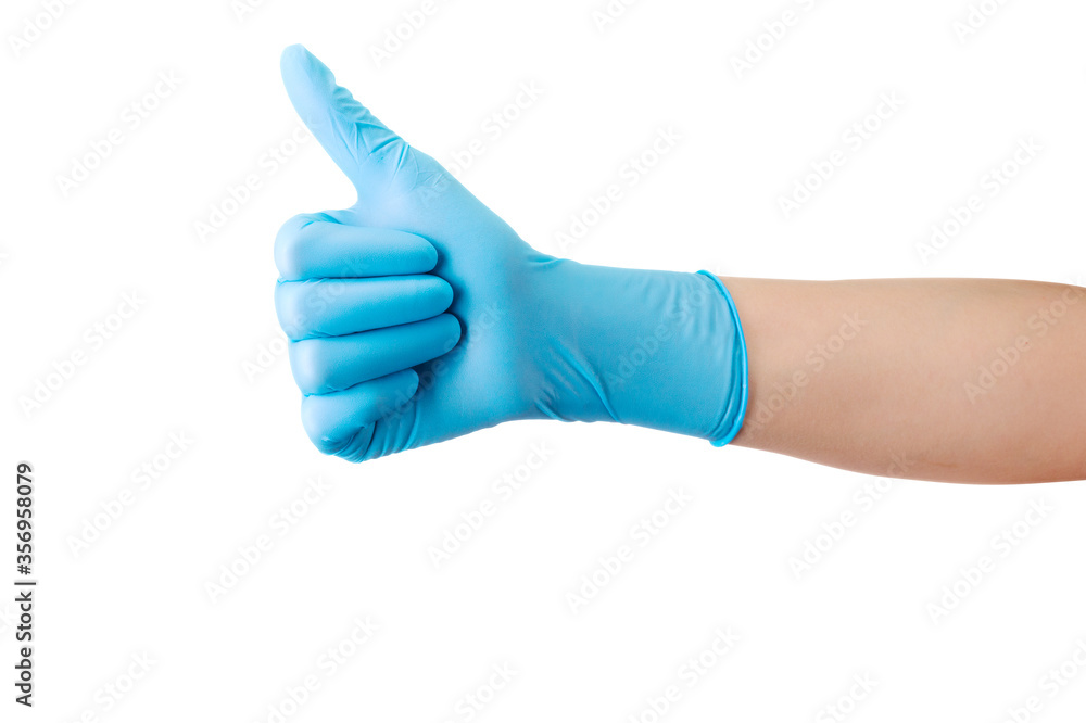 Doctor's hand in medical gloves in gesture of like sign giving thumb up isolated Doctor's hand in medical gloves in gesture of like sign giving thumb up isolated