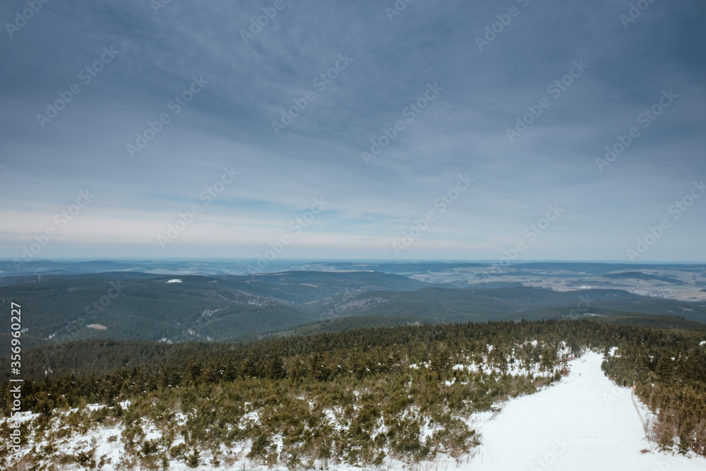 Snow-covered landscape with a wide view