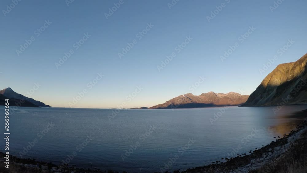 open sea view with mighty mountains in Northern Norway open sea view with mighty mountains in Northern Norway