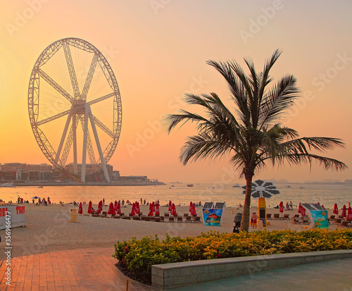 Photography Dubai, UAE - May 08, 2018: Dubai Marina promenade at sunset