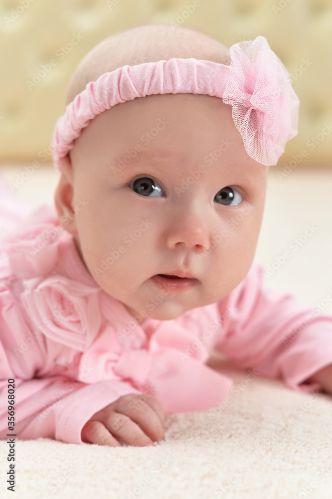 Portrait of cute little baby girl on bed Portrait of cute little baby girl on bed