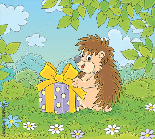 Joyful and friendly smiling little hedgehog holding a beautiful box with a holiday gift on a pretty glade of a green forest on a warm summer day, vector cartoon illustration