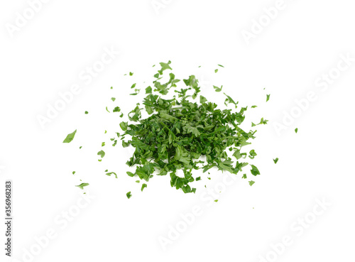 pile of chop fresh  parsley on white background