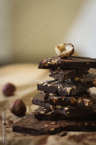 Fototapeta Naklejka Na Ścianę i Meble -  Almond and Hazelnut Dark Chocolate Stack