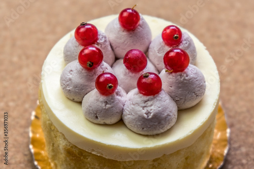 Cake closeup on wood background. Top view. Healthy fresh nutrition. Birthday and celebration. Organic fruit. Healthy food. 