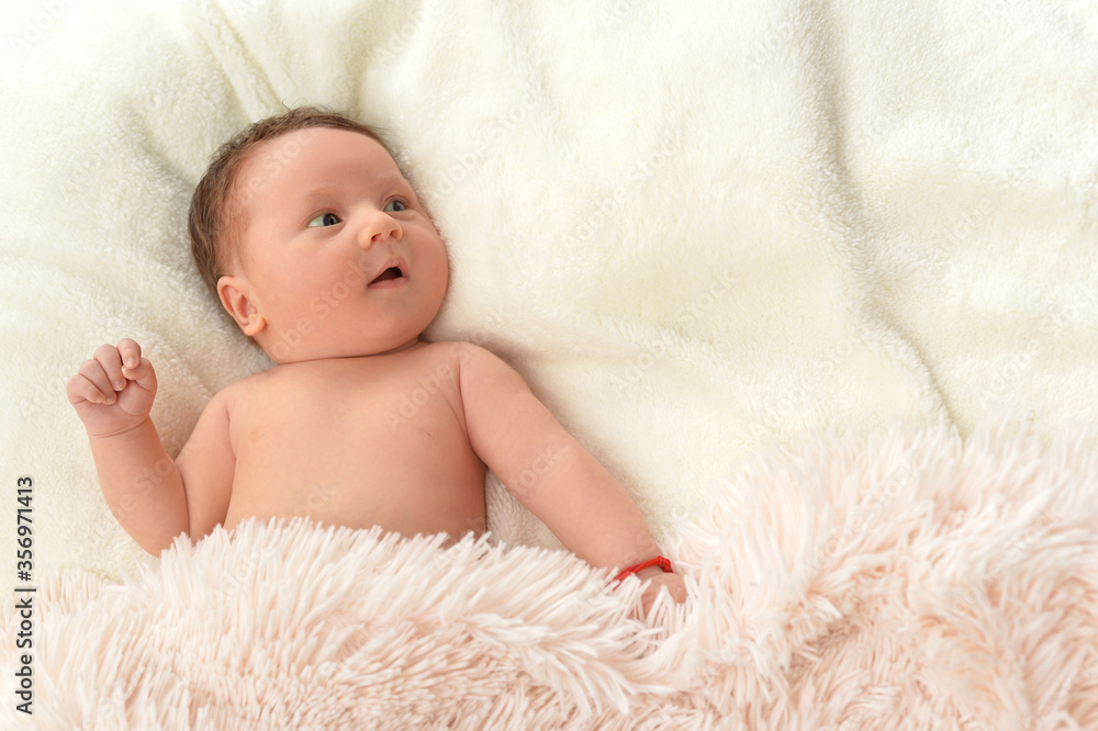 Portrait of cute little baby boy on bed Portrait of cute little baby boy on bed