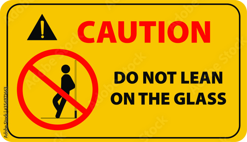 Do not lean on the glass sign