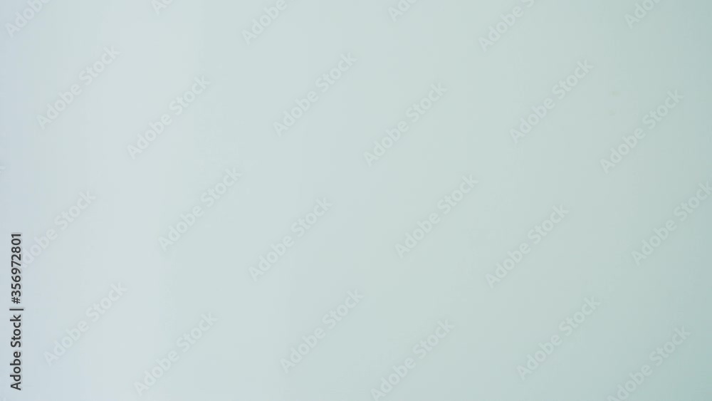Two hands of doctors in protective medical suits, blue rubber gloves make Fist Bump on white background. People show commitment and success in working. Protection concept during lock down period. Two hands of doctors in protective medical suits, blue rubber gloves make Fist Bump on white background. People show commitment and success in working. Protection concept during lock down period.