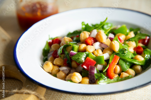 chickpeas salad with rucula and paprika