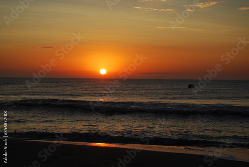 Dawn at the hair of the water in Pinamar, Argentina.