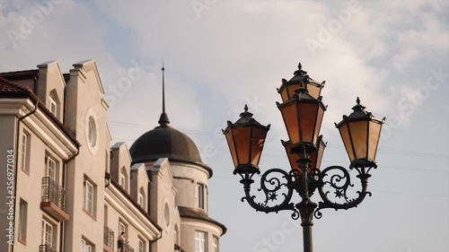 lamppost European building Visible rooftops.