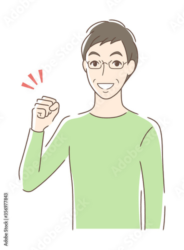 ガッツポーズする男性