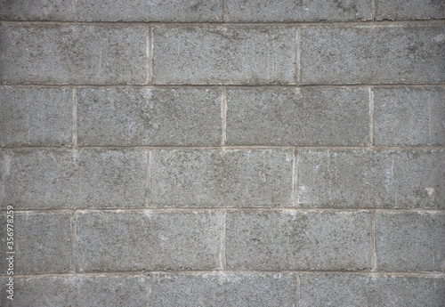 Old grey brick wall texture, abstract background