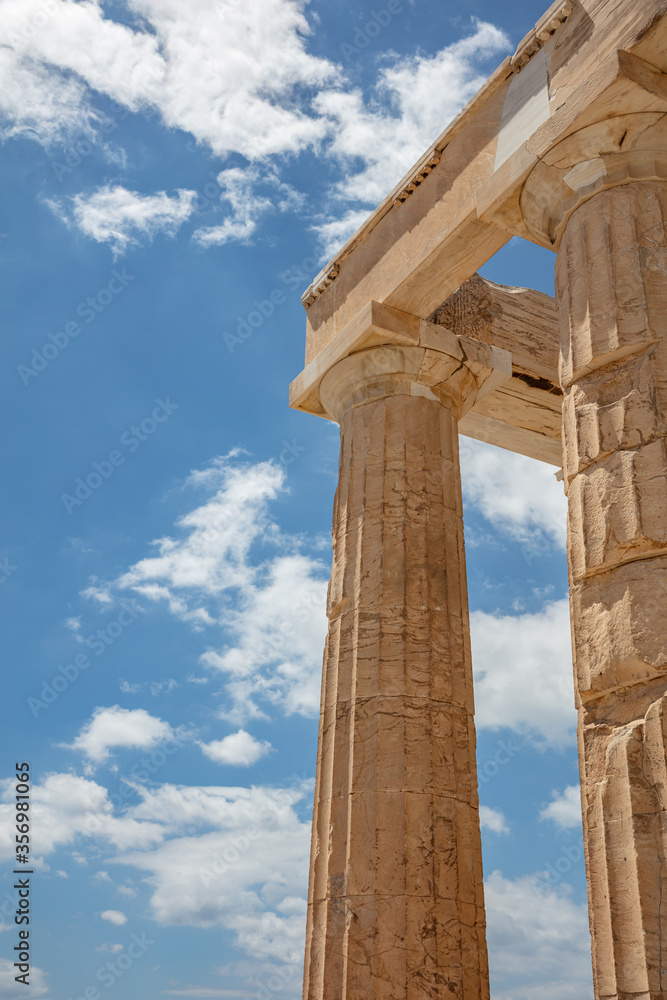 Athens, Greece. Propylaea in the Acropolis, monumental gate, blue cloudy sky