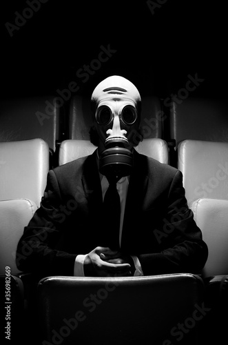 businessman in gas mask