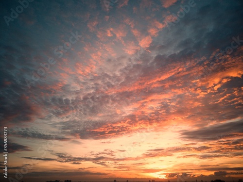 Sunlight over Bangkok Thailand with cloudy sky