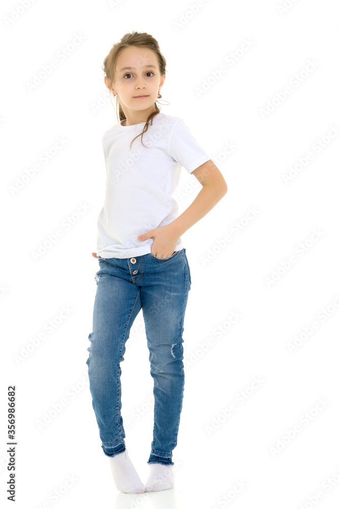 Girl in Blank White Shirt and Blue Jeans Standing Half Turn Girl in Blank White Shirt and Blue Jeans Standing Half Turn