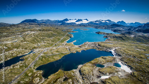 The road to the top of the mountains. Empty road of Norway. Bird's-eye view. Photos from the drone © NatBud