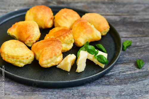 Fresh baked home made  Mini cheese puff pastries.Cheese pie with phyllo pastry and herbs