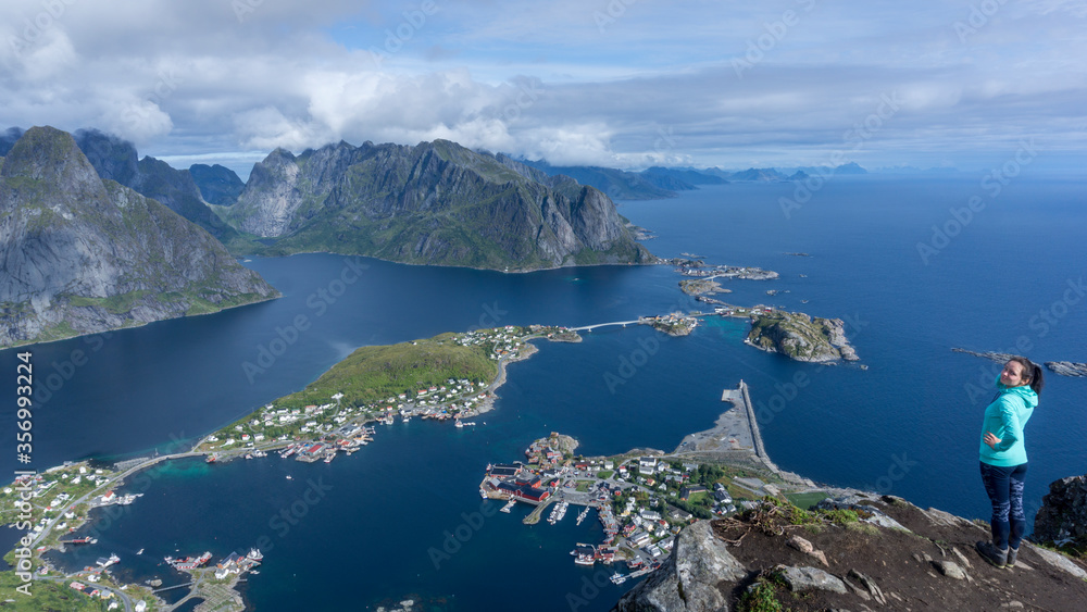 Lofoten Islands view from the top of Reinebringen to fjords and pristine blue waters
