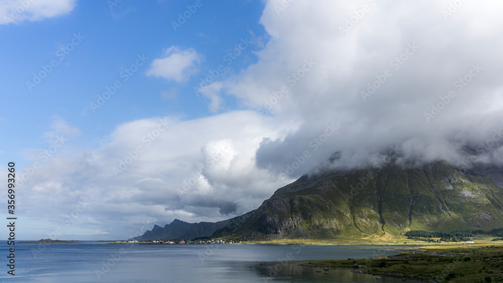 Fototapeta premium Powerful sky and nature in exotic Arctic circle, Norway, view to the fjords