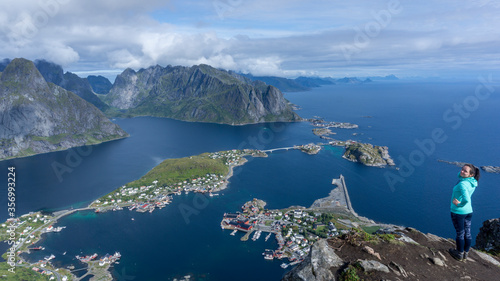 Lofoten Islands view from the top of Reinebringen to fjords and pristine blue waters © Imre T. Photography