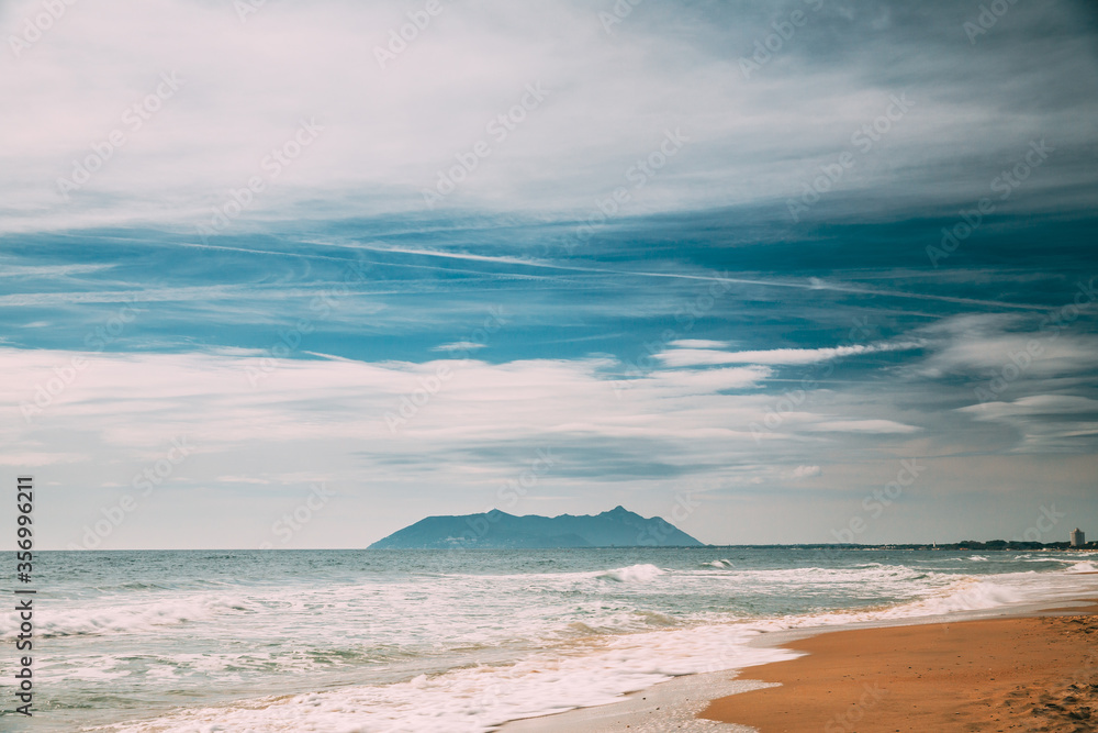 Terracina, Italy. View Of Coast Beach In And Monte Circeo Promontory In Tyrrhenian Sea On Background