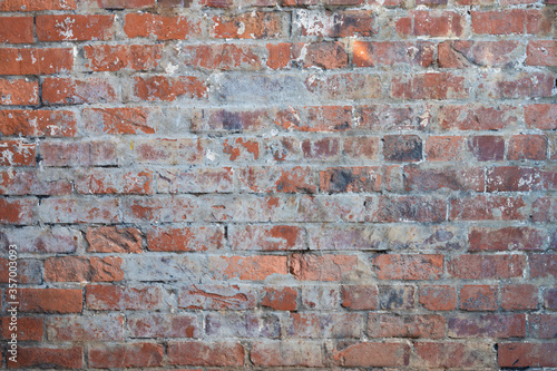 Closeup of weathered brick wall texture