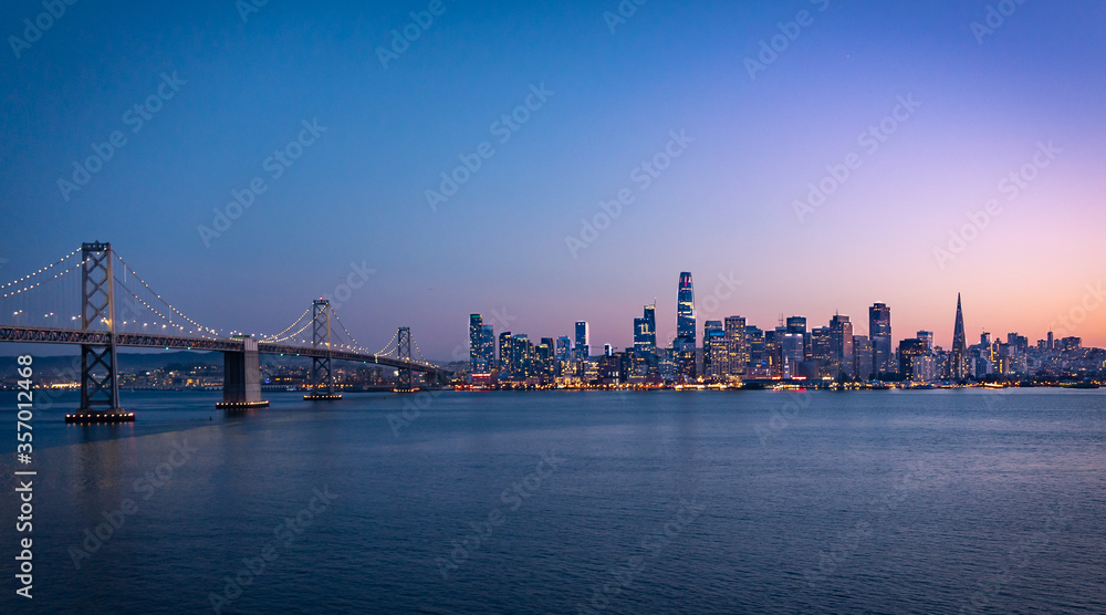San Francisco skyline and bay bridge at sunset